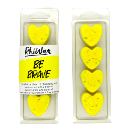 Two RhiWax Be Brave wax melt 4 heart clamshell. Wax melts are yellow hearts with yellow glitter.